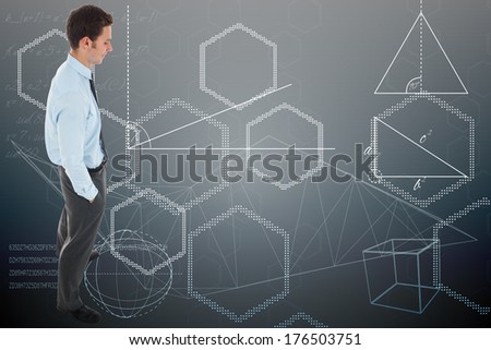 Happy businessman standing with hand in pocket against abstract technology background