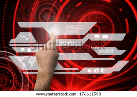 Hand pointing against shiny red circles on black background