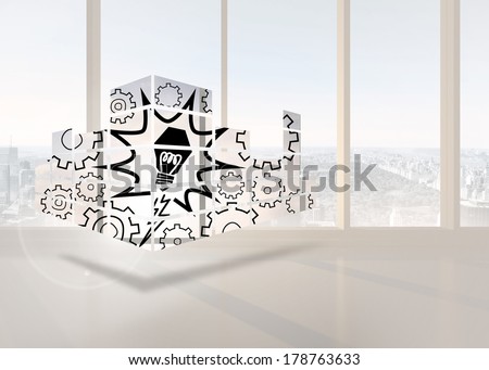 Light bulb on abstract screen against bright white room with windows