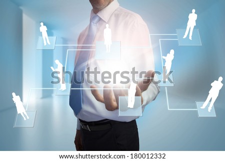 Digital composite of businessman presenting links between human representations