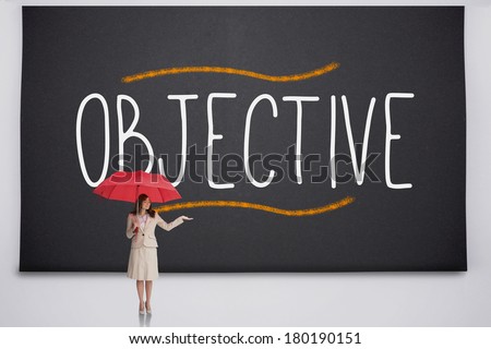 Businesswoman holding umbrella against the word objective