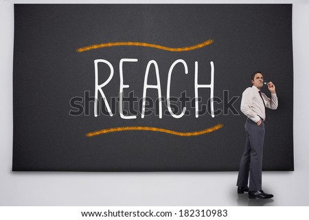 Businessman turning away from the word reach