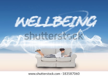 Business woman lying on couch against energy design over landscape