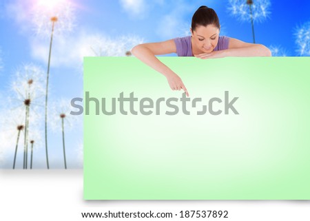 Composite image of pretty brunette showing green card