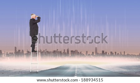 Mature businessman standing on ladder against cityscape on the horizon