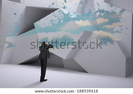 Stressed businessman with hands on head against splash showing cloudy sky
