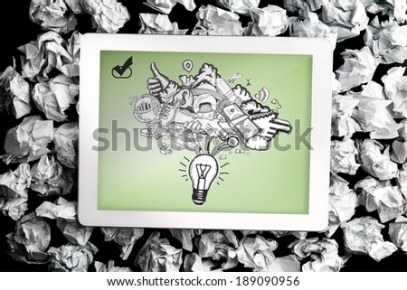 Ideas doodle on digital tablet on crumpled paper