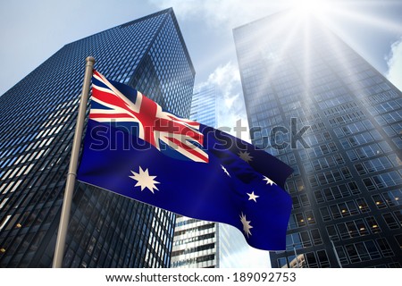 Australia national flag against low angle view of skyscrapers