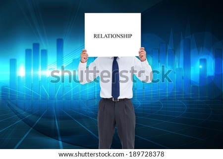 Businessman holding card saying relationship against blue bar chart graphic with light