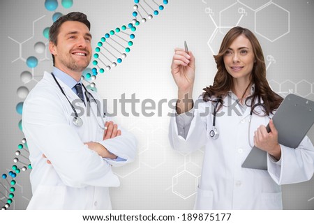 Composite image of medical team against dna helix in blue with chemical structures