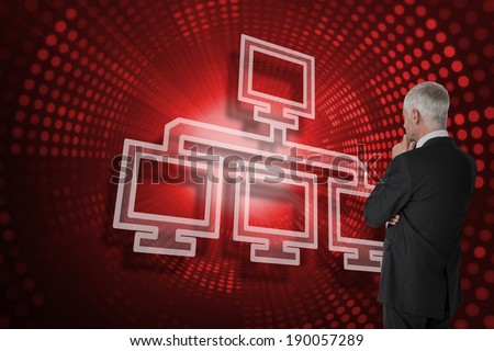 Composite image of computer connection and businessman looking against red pixel spiral