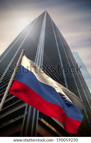 Russia national flag against low angle view of skyscraper