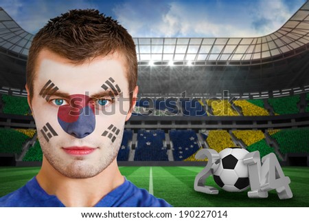 Composite image of serious young korea fan with face paint against large football stadium