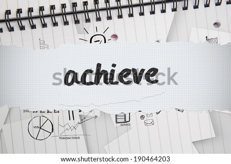 The word achieve against brainstorm doodles on notepad paper