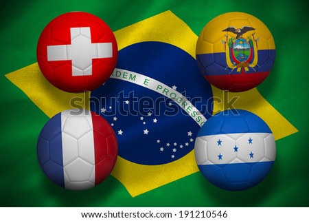 Group e world cup footballs on brasil flag background