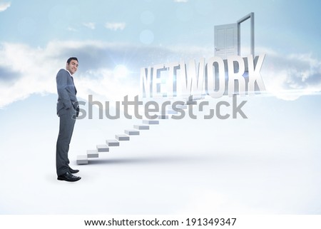 The word network and smiling businessman standing against white steps leading to open door