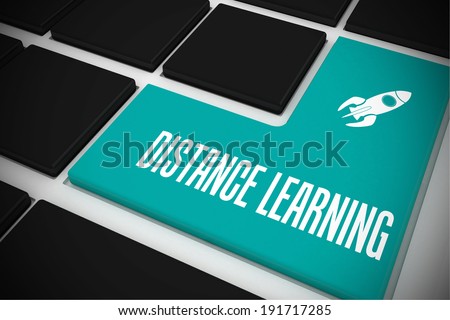 The word distance learning and rocket ship on black keyboard with blue key