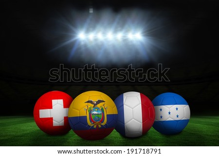 Group e world cup footballs under spotlight on pitch