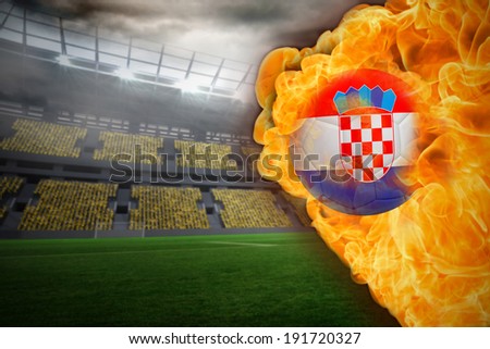 Composite image of fire surrounding croatia flag football against large football stadium with lights