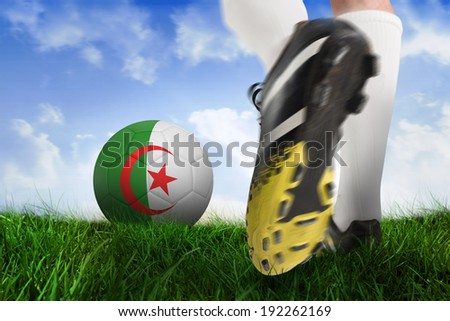 Composite image of football boot kicking iran ball against field of grass under blue sky