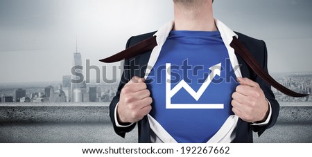 Businessman opening his shirt superhero style against balcony overlooking city
