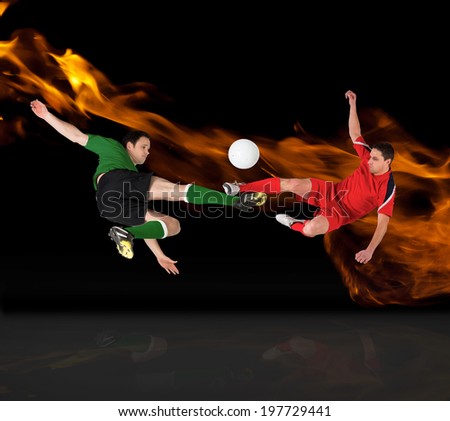 Football players tackling for the ball against orange fire design on black