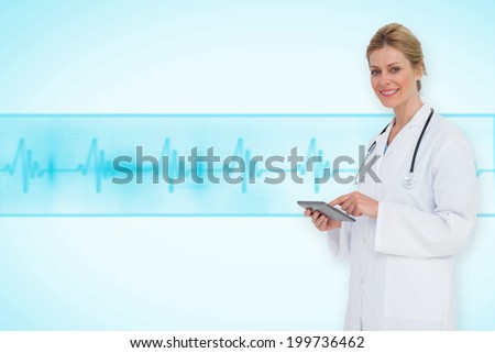 Blonde doctor using tablet pc against medical background with blue ecg line