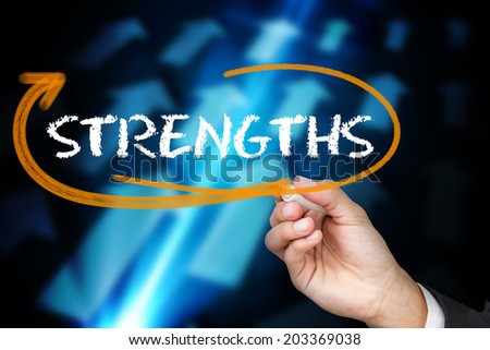 Businessman writing the word strengths against blue arrows on black background