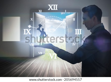 Businesswoman showing a cup held by giant businessman against open doors leading to sunny landscape