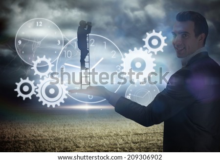 Businessman standing on ladder held by giant businessman against stormy sky with tornado over field