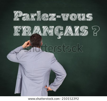 Thinking businessman against green chalkboard, Do you speak French?