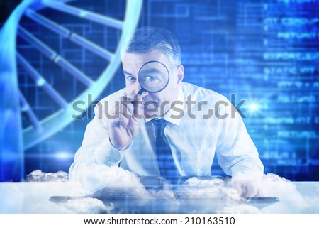 Mature businessman examining with magnifying glass against blue dna helix with texture