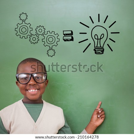 Cute pupil pointing against idea and innovation graphic