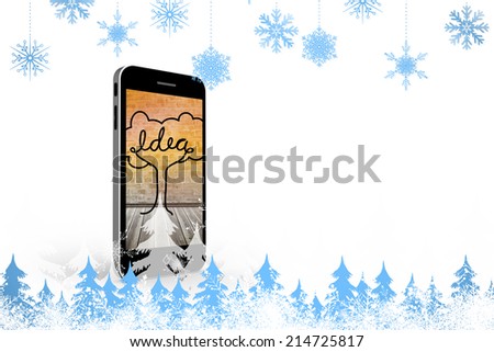 Snowflakes and fir trees against idea tree on smartphone screen