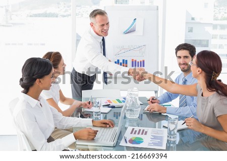Business man introducing new employee to the company