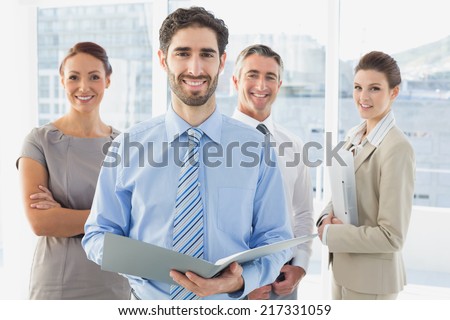 Employees having a business meeting in a conference room