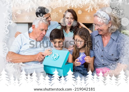 Extended family sitting on sofa with gift boxes in living room against fir tree forest and snowflakes