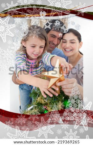 Composite image of family Christmas portrait against christmas frame
