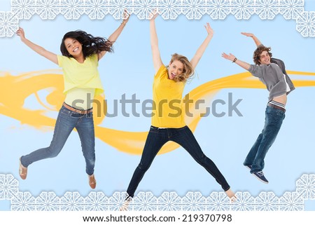 Attractive young man and women jumping for joy against snowflake frame