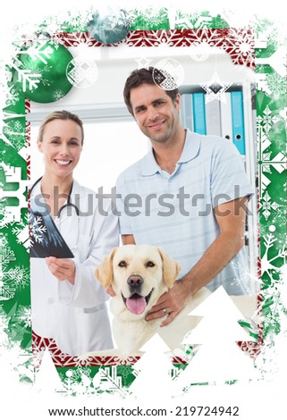 Pet owner and vet with Xray of dog against christmas themed frame
