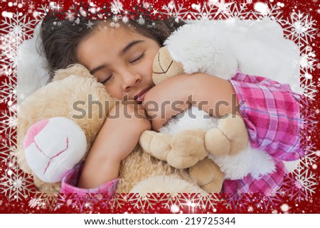 Composite image of snow frame against girl sleeping with stuffed toys in bed
