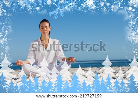 Composite image of snow frame against woman in white doing yoga on the beach