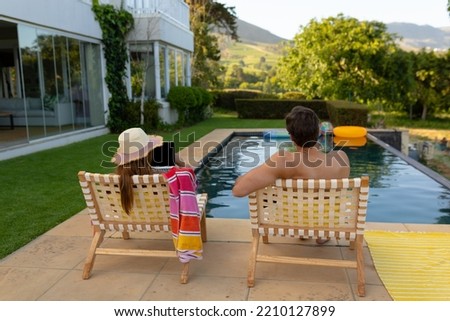 Similar – Image, Stock Photo Man chilling on deckchair in sunshine