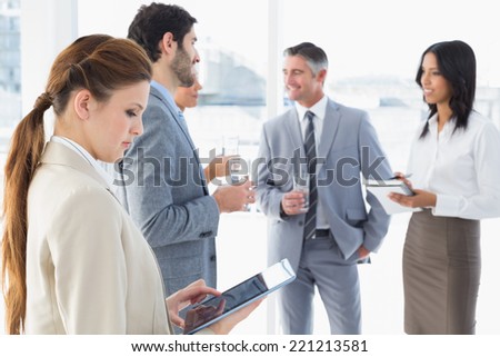 Business team having some drinks while working