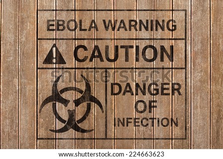 Ebola virus alert against wooden surface with planks