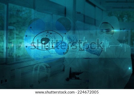 Scientist in protective suit working with cell diagram interface against ecg line in blue and black