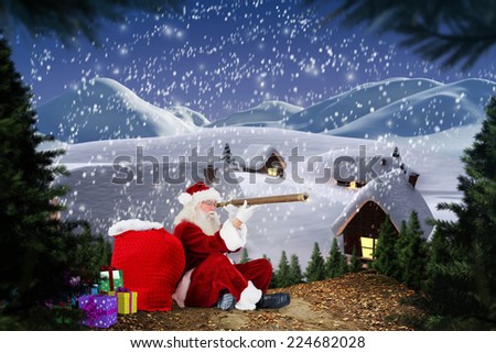 Santa looking through telescope against cute village in the snow