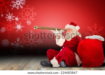 Santa claus looking through telescope against snowflake wallpaper over floor boards