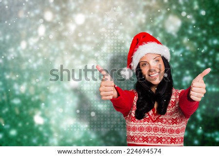 Woman giving a thumbs up against blurred lights