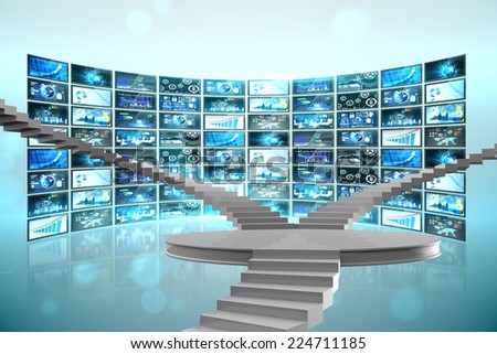 Winding stairs against screen collage showing business images